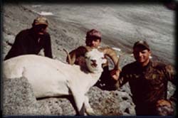 Michael Waitt (center) of Colorado with his Dall Ram