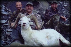 Joe Polunc (center) of Cologne, MN with guide Braun Kopsack (left) and assistant guide Dan Mielke (right) with his 160+ Dall Ram.