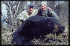 Russel Robinson (left) and Ron Kaufman (right) of Auburn, WA with his Spring Black Bear